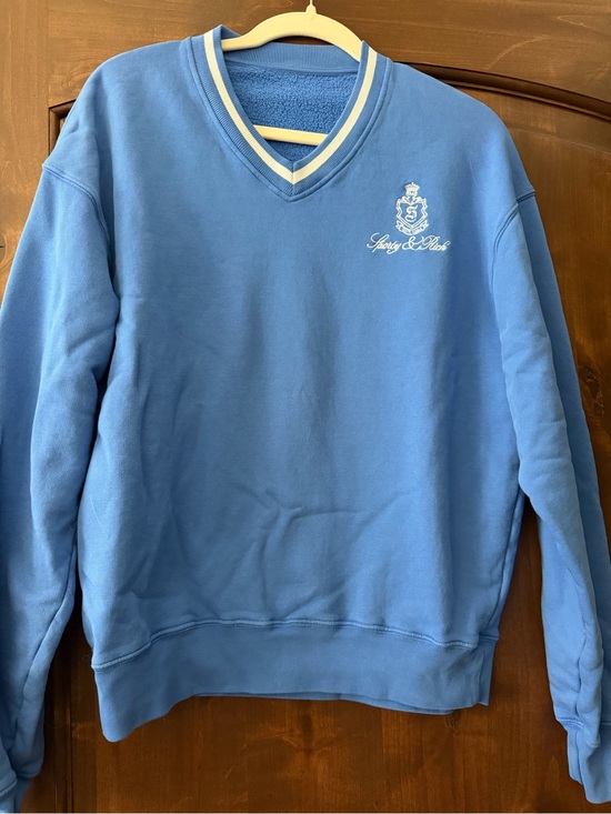 Sporty & Rich Tops - NWOT SIZE L Sporty & Rich Light Blue V-Neck Sweater with Cream Trim and Crest